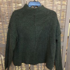 Dark green turtle neck sweater